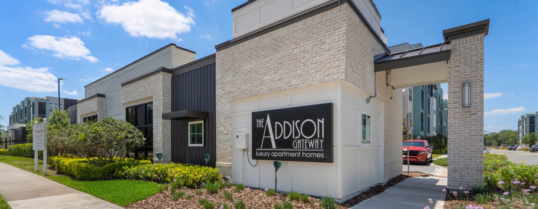 Addison Gateway building with property sign