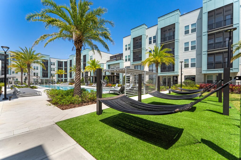 The Addison Gateway luxury pool and hammock lounge area